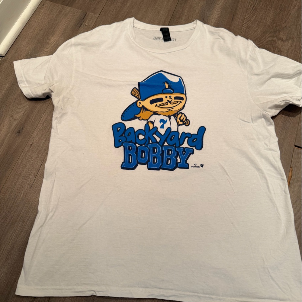White Graphic Tee with Blue 'Backyard Bobby' Cartoon